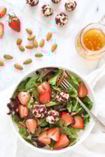 This beautiful Spring Berry Salad with Almond-Cranberry Crusted Goat Cheese is studded with strawberries and served over baby greens, but you can use any seasonal berries or a combination of berries instead. Serve this salad alone or alongside grilled chicken or fish.