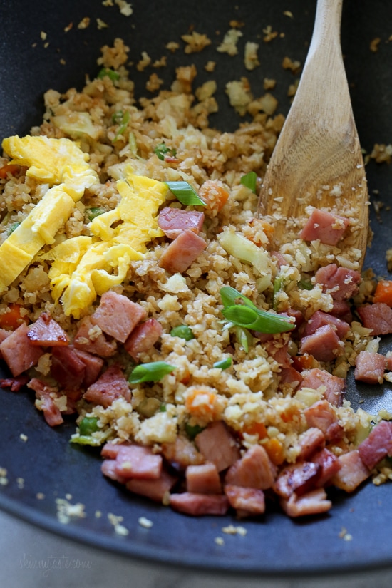 Cauliflower Fried "Rice" with Leftover Ham is a great way to use up that leftover Ham from the Holidays, which uses riced cauliflower in place of rice to make it low-carb and it's delicious!