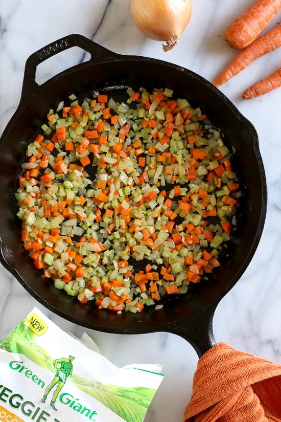 Skillet Chicken and Broccoli Veggie Tot Pie is the ultimate fast and easy, family-friendly, one-pan comfort dish! Made in a skillet with chicken breast, celery, carrots, and broccoli, then finished in the oven with broccoli and cheese veggie tots.