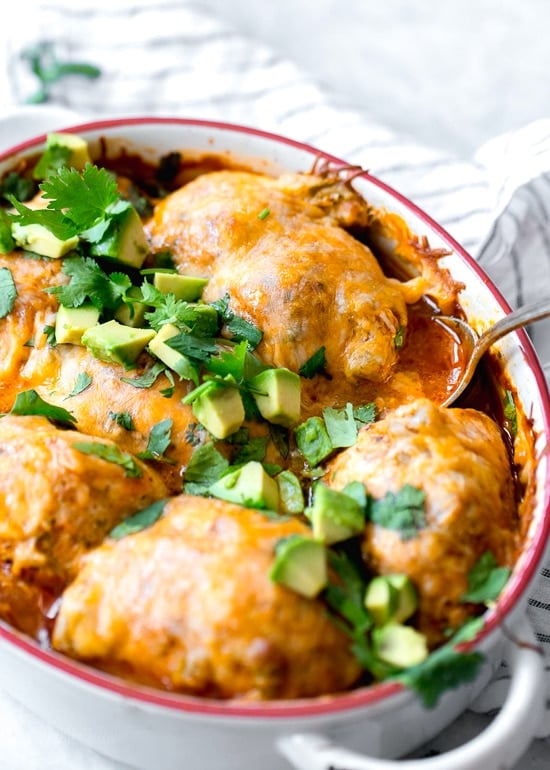 Chicken breasts on their own can be a bit boring. Roll ‘em up with cheese and green chilis, smother them in enchilada sauce and more cheese and now you’re talking. These Enchilada Chicken Roll-Ups give you authentic enchilada flavor without all the work, calories or fat. And you won’t even miss the tortillas!