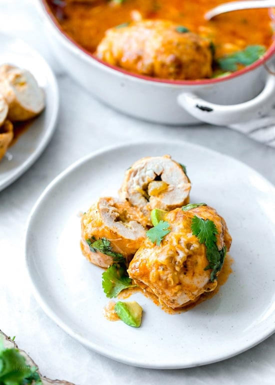 Chicken breasts on their own can be a bit boring. Roll ‘em up with cheese and green chilis, smother them in enchilada sauce and more cheese and now you’re talking. These Enchilada Chicken Roll-Ups give you authentic enchilada flavor without all the work, calories or fat. And you won’t even miss the tortillas!