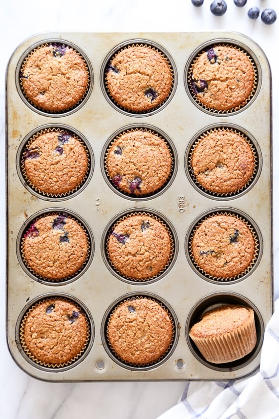 These Gluten-Free, Dairy-Free, Blueberry Oatmeal Muffins are insanely good. So moist, and lightly sweetened, studded with blueberries in every bite!