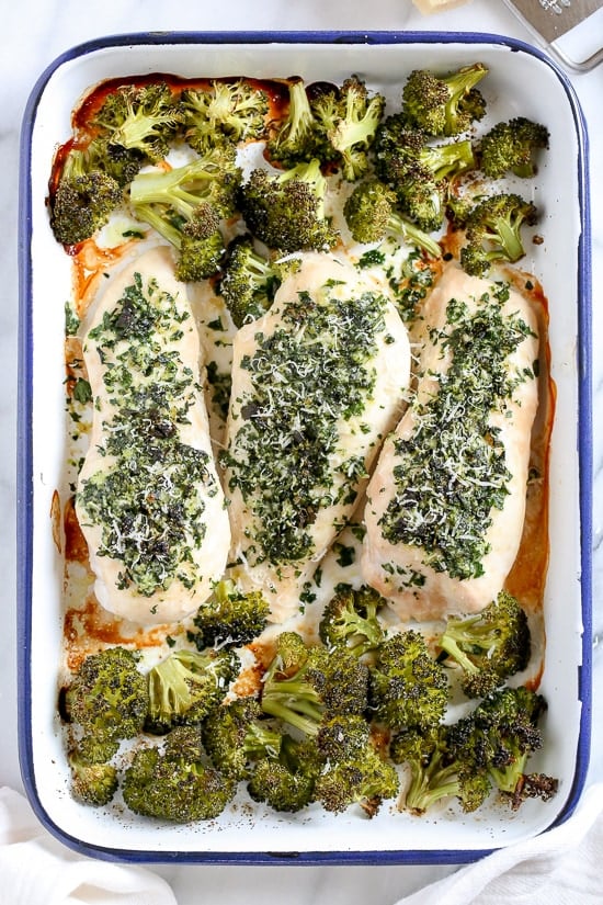 This simple Parmesan-Crusted Baked Chicken Breast is made on a sheet pan with broccoli, for a one pan dish that is so quick, and the best part, easy clean up!