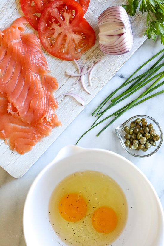 This Goat Cheese Herb Omelet topped with Nova Lox, sliced tomatoes and capers satisfies my bagel-and-lox craving, without the bagel! SO quick, takes about 5 minutes to make!