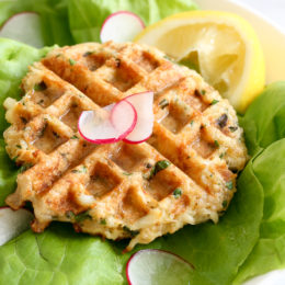 Dust off that waffle machine to make these fast and delicious Waffled Crab Cakes! This is so genius you're going to wonder why you haven't thought of this sooner. The crab cakes cook perfectly in the center, with golden edges in less than 3 minutes! And you get perfect little square pockets to hold the lemon juice or tartar sauce.