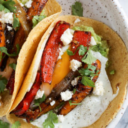 I just love tacos with eggs, and these breakfast fajitas are no exception. Loaded with peppers and onions, guacamole and a runny egg on top (you can prepare the eggs however you like).