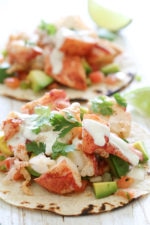 These lobster tacos are made with steamed chunks of lobster meat, avocado and pico de gallo, topped with a spicy poblano crema. If you want to step up your fish taco game, you need these in your life!