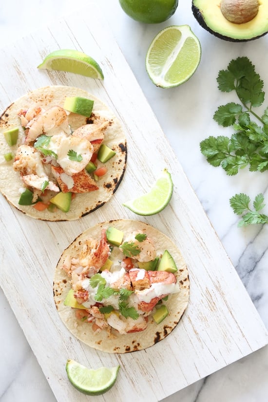 These lobster tacos are made with steamed chunks of lobster meat, avocado and pico de gallo, topped with a spicy poblano crema. If you want to step up your fish taco game, you need these in your life!