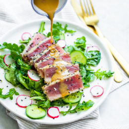 This panko and sesame crusted seared tuna on a bed of arugula and spinach salad, all topped with a wasabi butter sauce, takes Japanese food to whole new level!