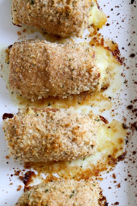 This Cubano Chicken Roll Up idea came to me after having a serious pickle craving! I wanted to make a hot dish utilizing dill pickles in some way and decided to stuff a chicken breast with everything you'd normally find in a Cuban Sandwich – pickles, mustard, Swiss, and ham. But I took it a step further and brined the cutlets overnight in pickle juice for extra flavor, the results were outstanding!!!