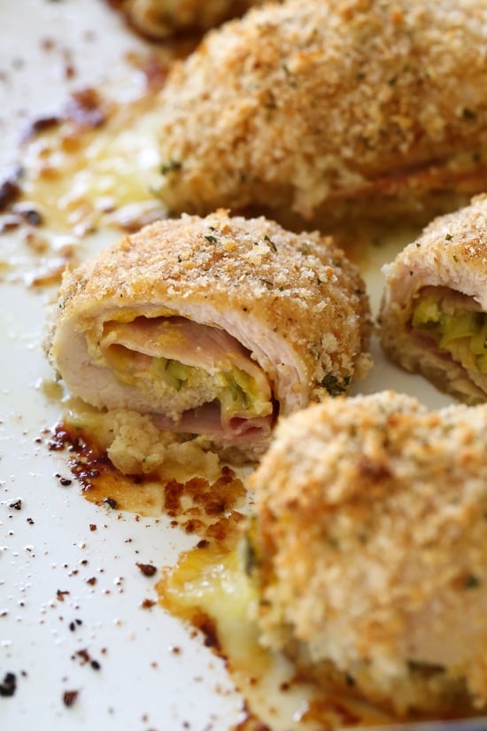 This Cubano Chicken Roll Up idea came to me after having a serious pickle craving! I wanted to make a hot dish utilizing dill pickles in some way and decided to stuff a chicken breast with everything you'd normally find in a Cuban Sandwich – pickles, mustard, Swiss, and ham. But I took it a step further and brined the cutlets overnight in pickle juice for extra flavor, the results were outstanding!!!