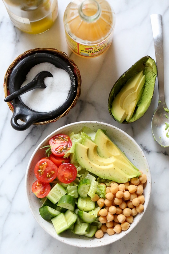 This Chickpea and Avocado salad is my go-to lunch when I need something fast and healthy! I load it up with garden vegetables and top it with a little olive oil and lemon, or olive oil and vinegar depending on my mood. Super simple, fresh and fills me up!