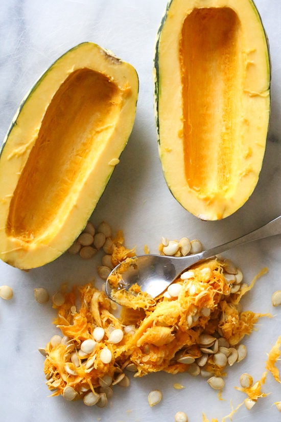 Roasted Delicata squash is delicious topped with a Parmesan-herb crust. The edges come out crisp, golden and delicious.