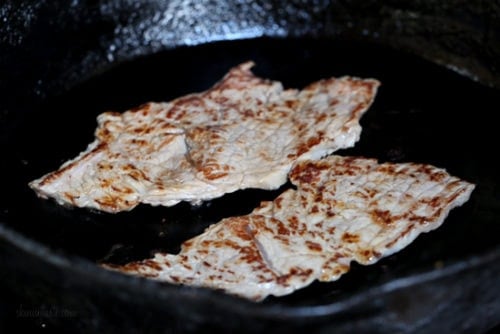 cooking thin steaks on a hot skillet