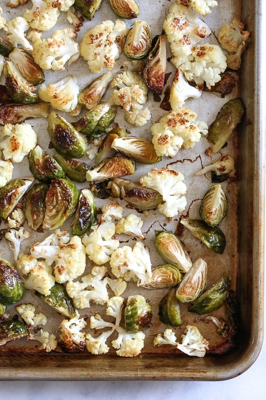 It's October, so Pumpkin Mac and Cheese with Roasted Cauliflower and Brussels Sprouts is a must for the Fall! Using pumpkin puree makes a creamy light cheese sauce, without having to add cream or too much cheese. You can make your own pumpkin puree or use organic canned pumpkin to make it faster!
