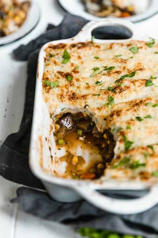 This fast and fresh vegetarian Shepherd’s Pie made with Portobello mushroom, carrots, peas, corn, and onions, all topped with leftover Skinny Garlic Mashed Potatoes, is the perfect after-Holiday fix.