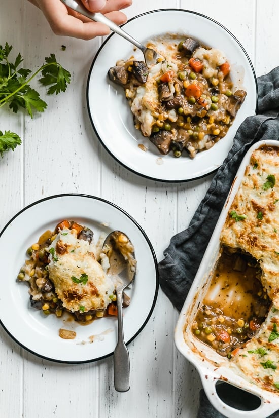 This fast and fresh vegetarian Shepherd’s Pie made with Portobello mushroom, carrots, peas, corn, and onions, all topped with leftover Skinny Garlic Mashed Potatoes, is the perfect after-Holiday fix.