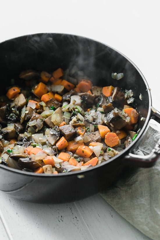 This fast and fresh vegetarian Shepherd’s Pie made with Portobello mushroom, carrots, peas, corn, and onions, all topped with leftover Skinny Garlic Mashed Potatoes, is the perfect after-Holiday fix.