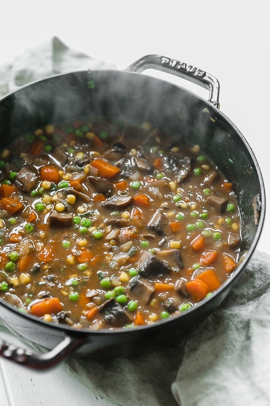 This fast and fresh vegetarian Shepherd’s Pie made with Portobello mushroom, carrots, peas, corn, and onions, all topped with leftover Skinny Garlic Mashed Potatoes, is the perfect after-Holiday fix.