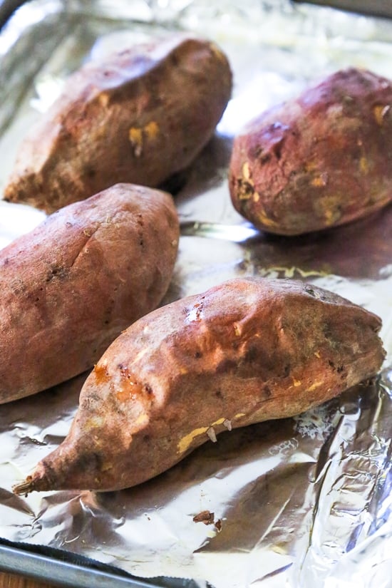 These savory stuffed sweet potatoes are topped with Italian flavors such as marinara sauce and mozzarella cheese. A quick and easy healthy vegetarian dish.