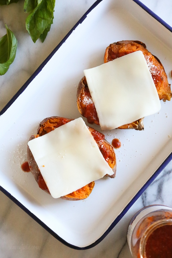 These savory stuffed sweet potatoes are topped with Italian flavors such as marinara sauce and mozzarella cheese. A quick and easy healthy vegetarian dish.