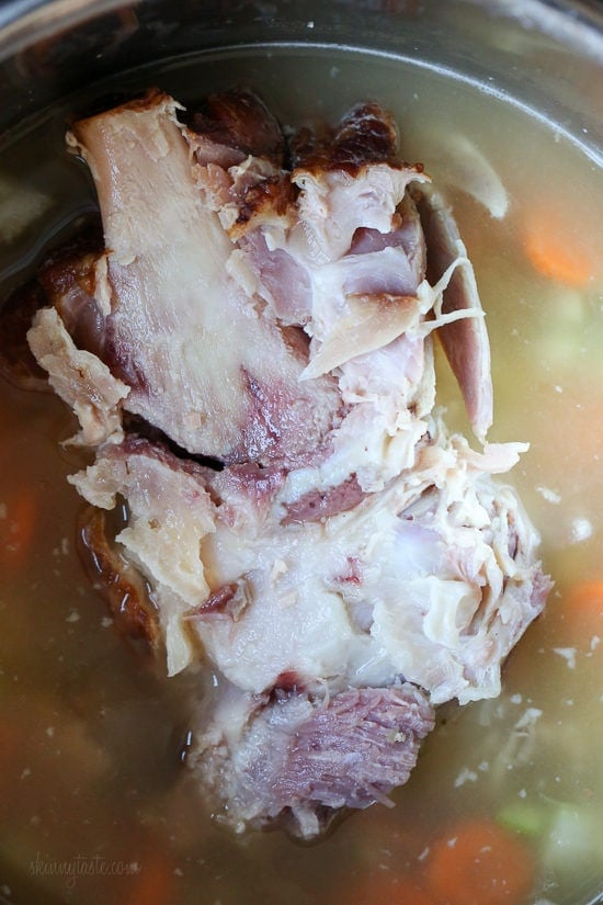 If you’re looking for leftover ham recipes, you’ll love this leftover ham bone and potato soup! It’s hearty, flavorful, and easy to make too. Ham bone in pot of soup