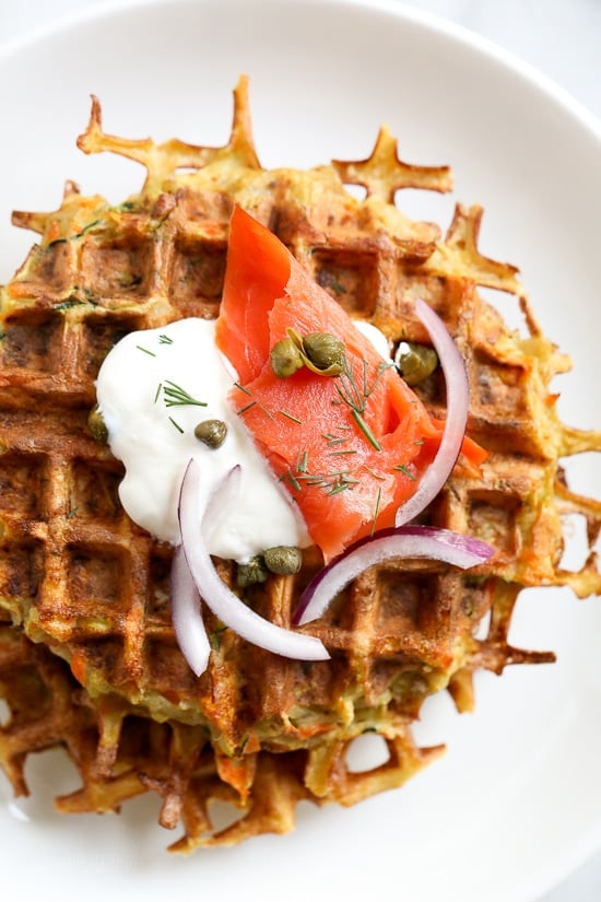 These veggie-packed latkes, are not your traditional latkes, they’re made with shredded potatoes, carrots, zucchini and bell pepper, and they are cooked in a waffle iron so there’s no need to fry! Top them with sour cream, lox and capers or with apple sauce on the side.
