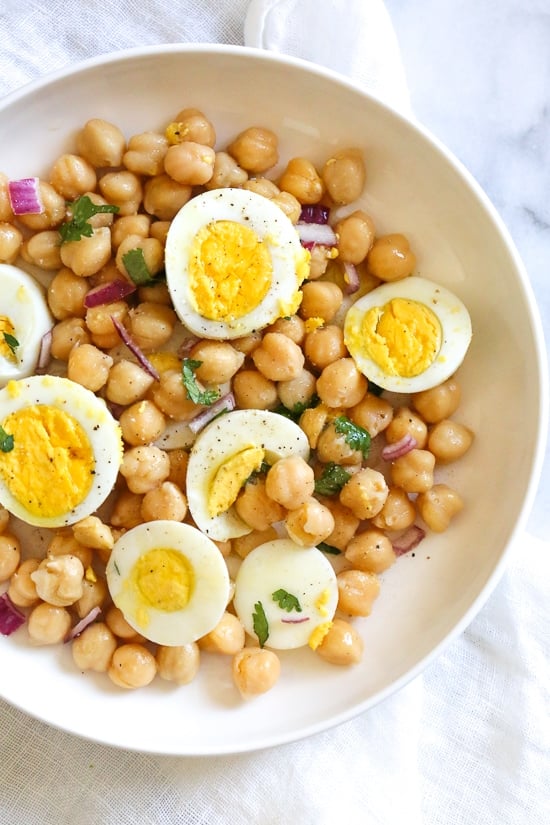 This easy chickpea and egg salad is so simple and delicious for lunch (or breakfast!). It's inexpensive to make, high in protein and fiber and great to make ahead for the week.
