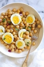 This easy chickpea and egg salad is so simple and delicious for lunch (or breakfast!). It's inexpensive to make, high in protein and fiber and great to make ahead for the week.