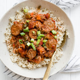 This New Orleans-inspired slow-cooker dish with chicken and Andouille sausage simmered in a rich tomato broth, is perfect to make for Fat Tuesday!