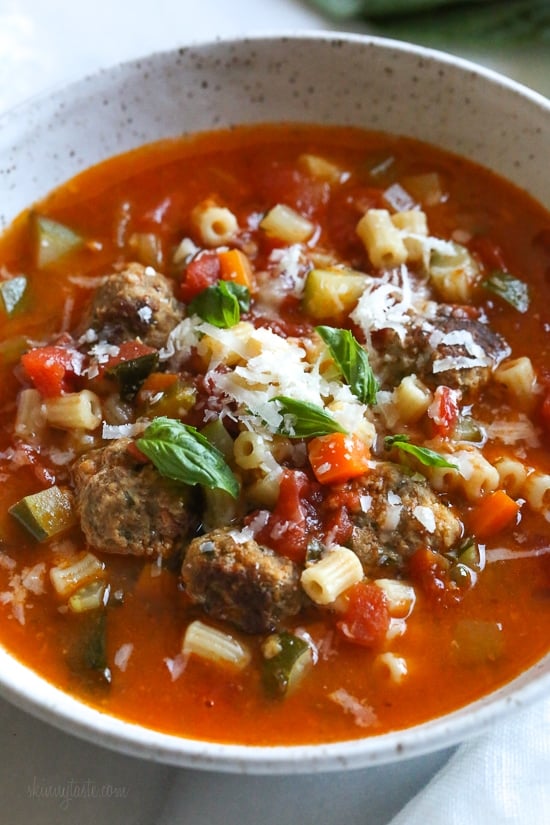 A white bowl of turkey meatball soup