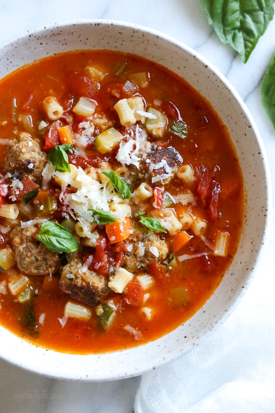 Instant Pot Turkey Meatball Soup is loaded with mini turkey meatball, zucchini, vegetables, and ditalini pasta. Hearty and healthy! A bowl of turkey meatball and ditalini soup topped with shredded cheese