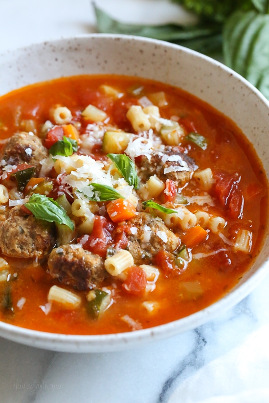 Instant Pot Turkey Meatball Soup is loaded with mini turkey meatball, zucchini, vegetables, and ditalini pasta. Hearty and healthy! A bowl of turkey meatball soup topped with grated parmesan