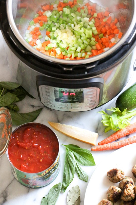 Instant Pot Turkey Meatball Soup is loaded with mini turkey meatball, zucchini, vegetables, and ditalini pasta. Hearty and healthy! Diced celery, carrots, and onions in the Instant Pot