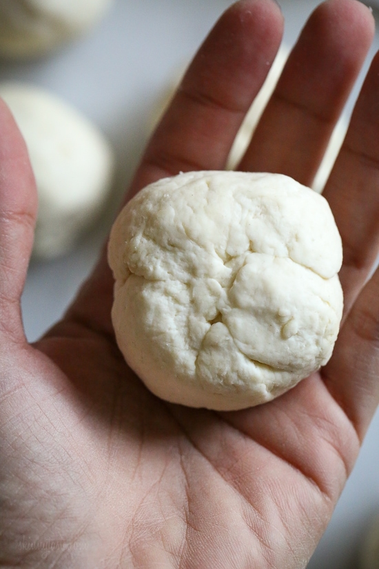 Easy, homemade, mini stuffed bagel balls filled with cream cheese! This copycat Bantam Bagels recipe is made with no yeast, no boiling, no fancy mixer!