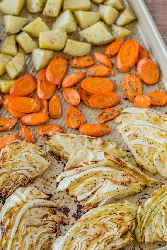 Leave the same old Corned Beef behind for this Corned Turkey and Cabbage Dinner made with all the same pickling spices and roasted vegetables. Roasted Corned Beef Vegetables on baking sheet