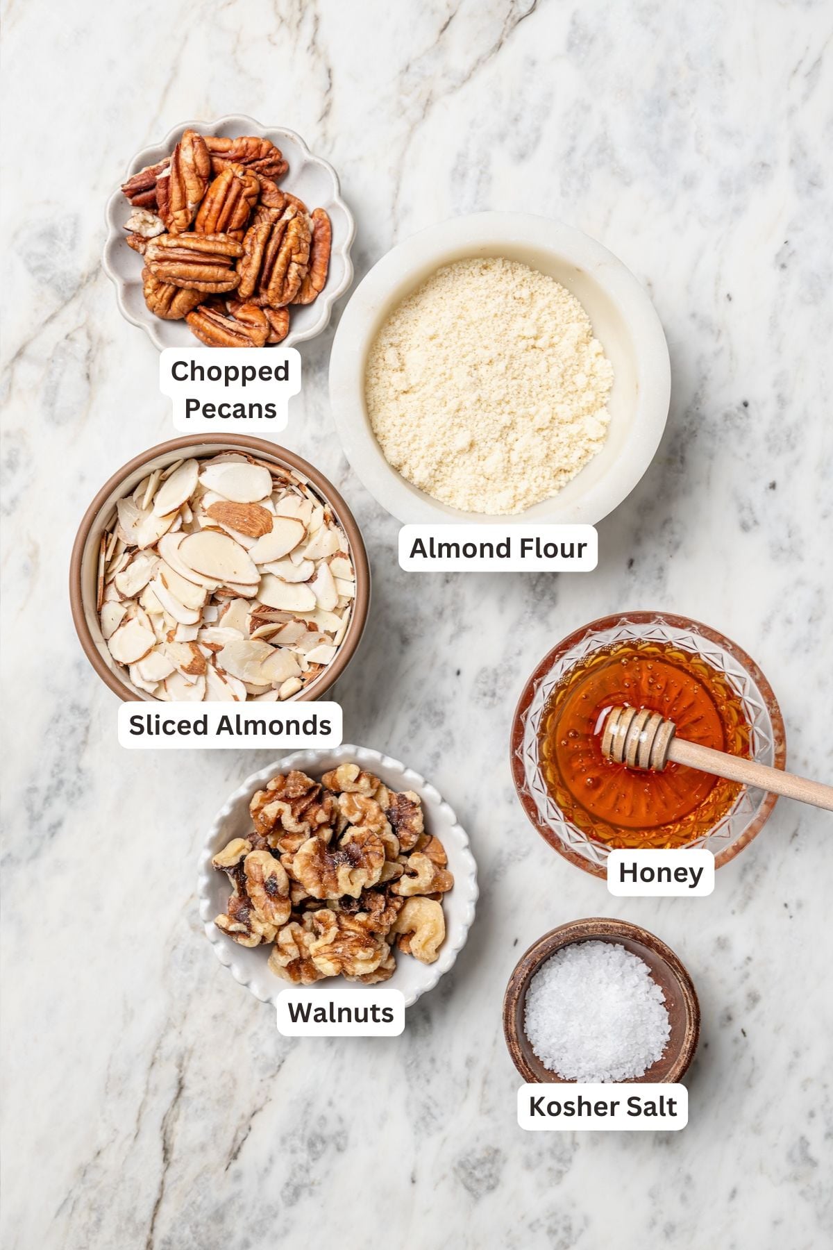 Overhead view of nut topping ingredients for strawberry crisp
