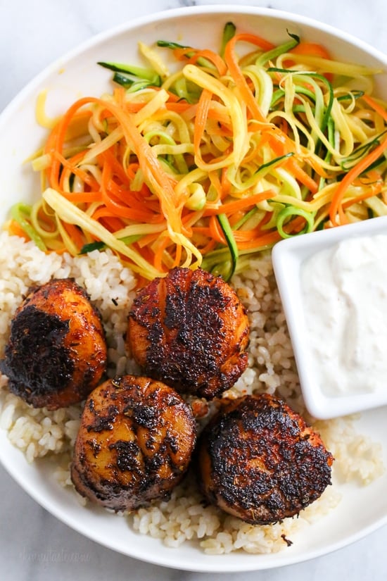 These quick seared Blackened Sea Scallops are coated in a homemade blend of blackened seasoning, then cooked in a cast iron skillet served with a creamy horseradish sauce.