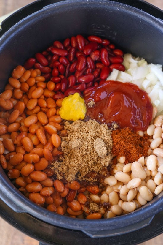 Instant Pot Brown Sugar Baked Beans are a quick and easy summer side dish thanks to the instant pot with all the hearty, filling, baked bean flavors you love. Instant Pot Baked Beans