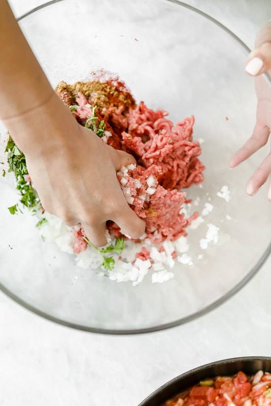 Moroccan Kefta Meatballs made with tomatoes and olives are simmered together in the slow cooker or Instant Pot in this easy and exotic Moroccan dinner.