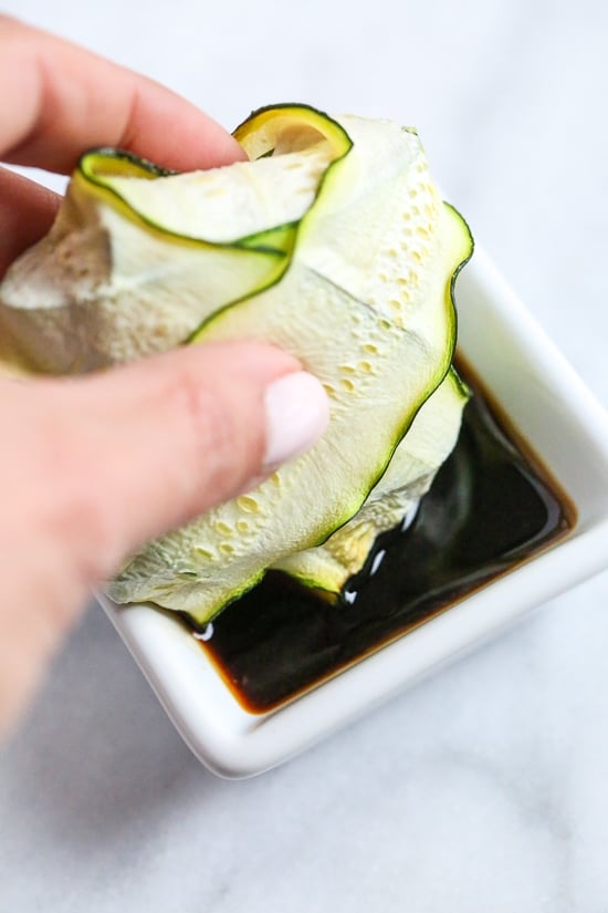 These low-carb pork dumplings, made with zucchini in place of dough are so dang good, you won't miss the carbs! They are also keto, paleo, gluten-free and whole30 friendly!