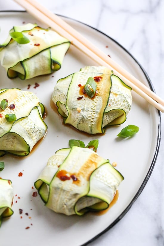 These low-carb pork dumplings, made with zucchini in place of dough are so dang good, you won't miss the carbs! They are also keto, paleo, gluten-free and whole30 friendly!