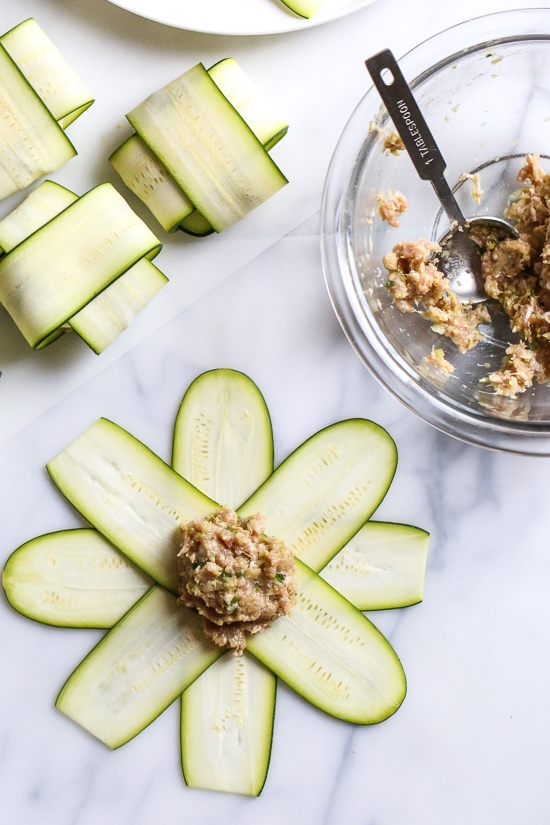 These low-carb pork dumplings, made with zucchini in place of dough are so dang good, you won't miss the carbs! They are also keto, paleo, gluten-free and whole30 friendly!