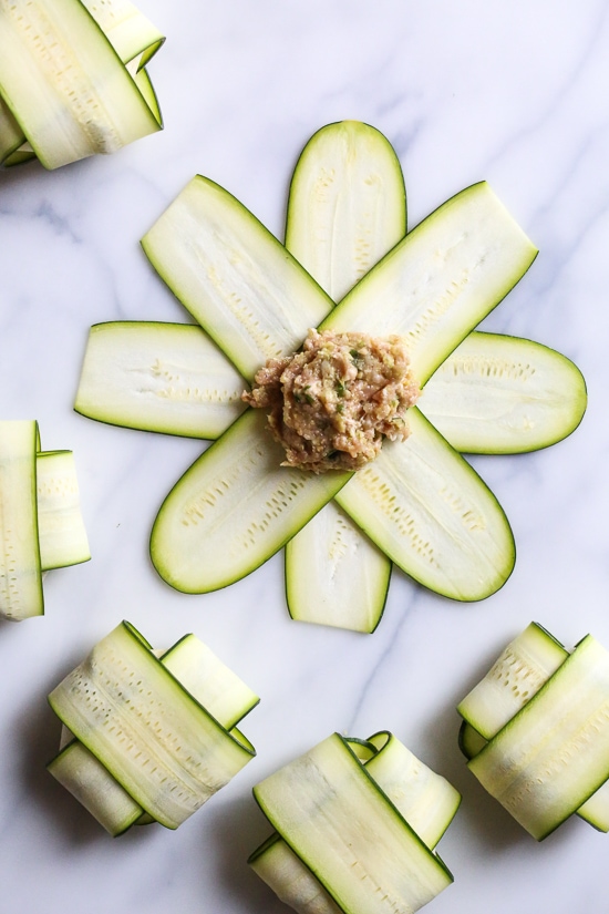 These low-carb pork dumplings, made with zucchini in place of dough are so dang good, you won't miss the carbs! They are also keto, paleo, gluten-free and whole30 friendly!