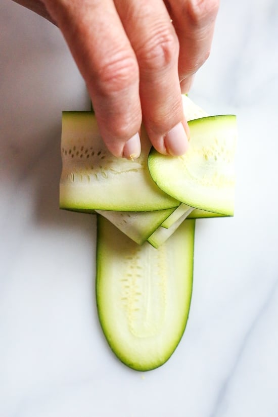 These low-carb pork dumplings, made with zucchini in place of dough are so dang good, you won't miss the carbs! They are also keto, paleo, gluten-free and whole30 friendly!