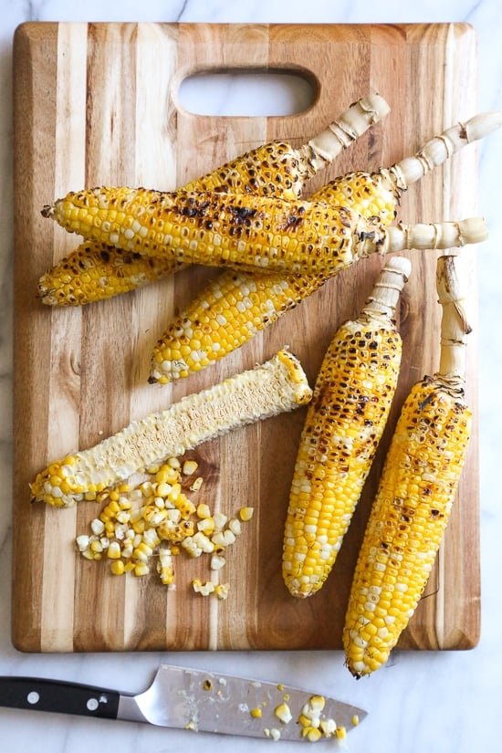 This charred Grilled Corn and Feta Salad is an easy 5-ingredient summer side dish. It goes perfect with anything you're grilling!