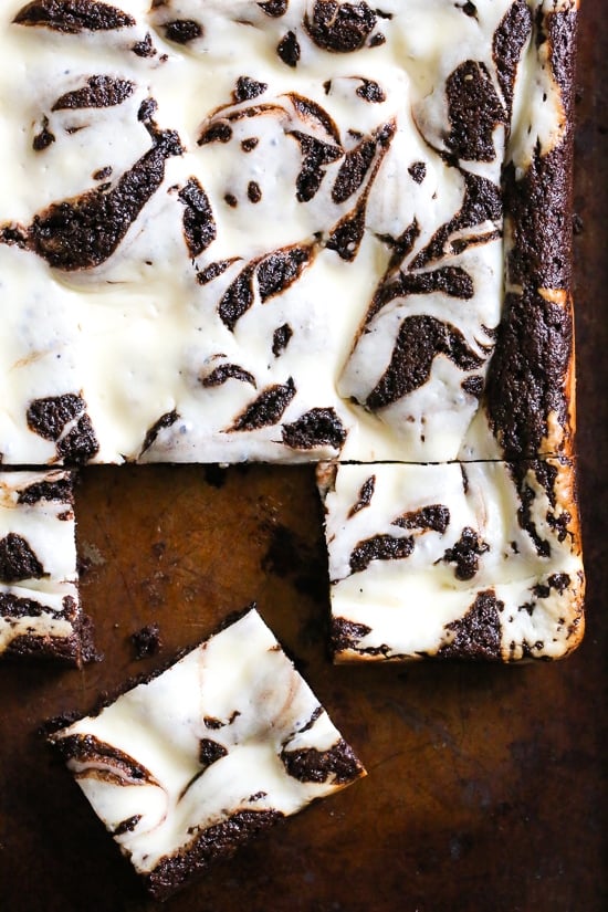 These homemade, cheesecake brownies are SO good and they are gluten-free and flourless by using almond meal in place of wheat flour, then swirled with a cheesecake topping! 