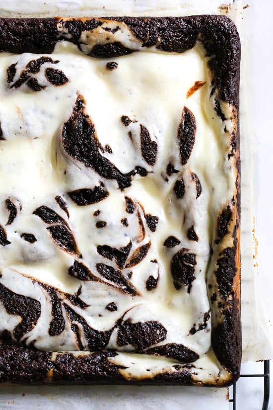 These homemade, cheesecake brownies are SO good and they are gluten-free and flourless by using almond meal in place of wheat flour, then swirled with a cheesecake topping!