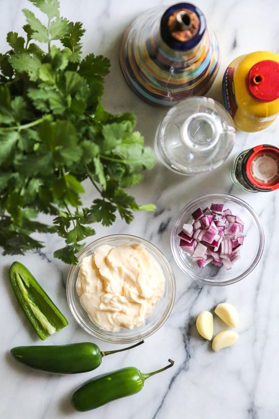 Peruvian green sauce also known as Aji Verde is a spicy bright green condiment typically found in any Peruvian restaurant.