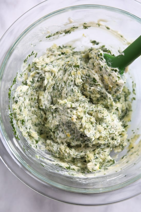 Grilled Lobster Tails topped with Herb Garlic Butter are a delicious delicacy, and grilling them is super quick and easy!